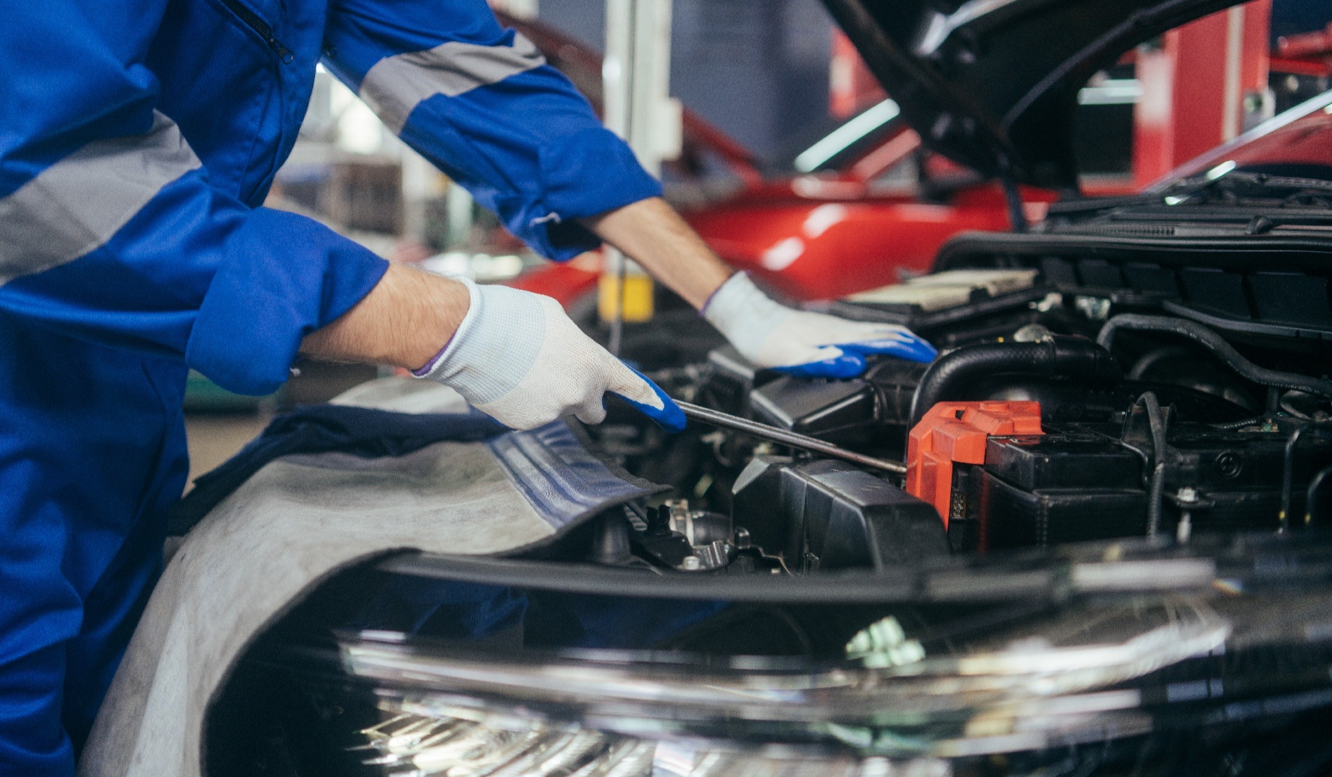 automobile-mechanic-man-checking-car-damage-part-a-2023-11-27-05-14-21-utc-1