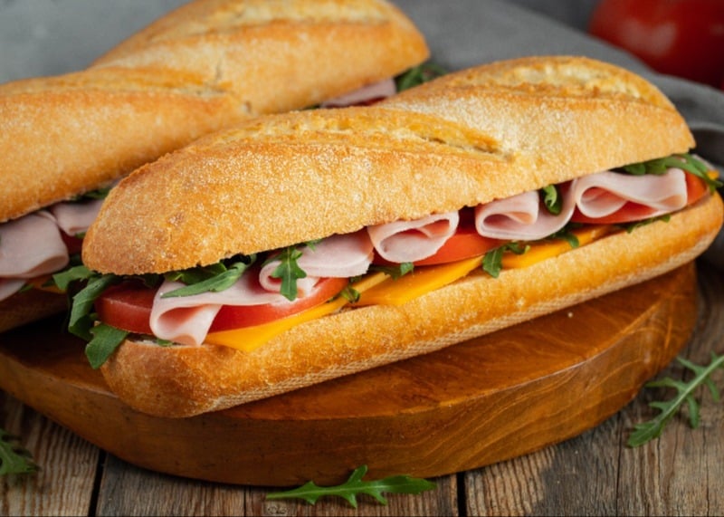 two-long-baguette-sandwiches-with-ham-and-cheese-2022-08-23-09-17-54-utc-1